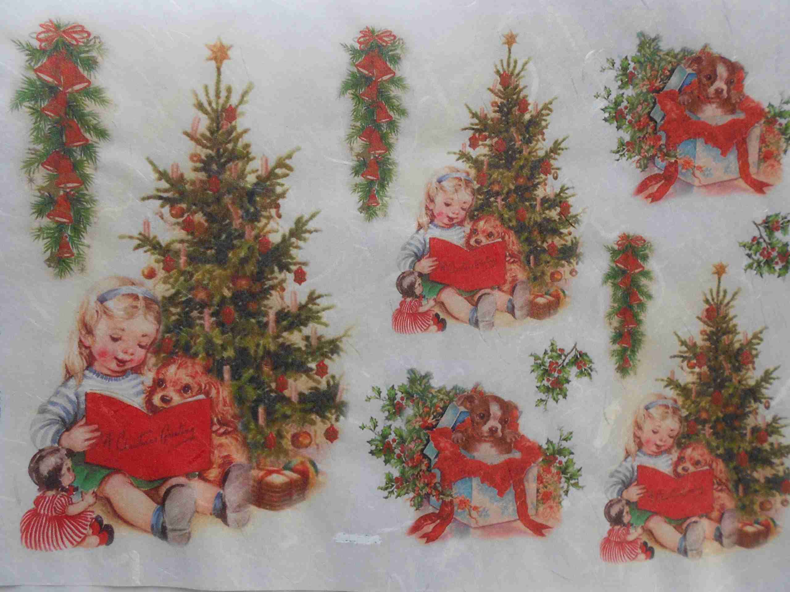 Girl with book by Christmas tree decoupage rice paper